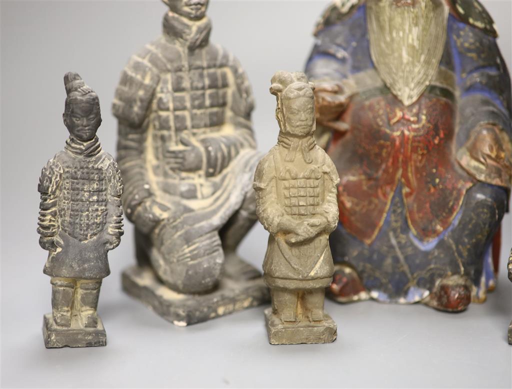 Five various Chinese pottery figures, a composite figure and a painted wood figure, tallest 20cm